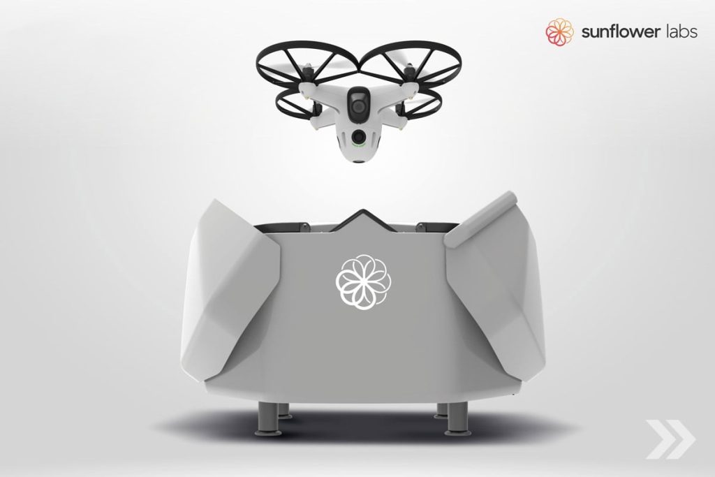Sistema integrado de dron autónomo con estación de carga y almacenamiento automático.